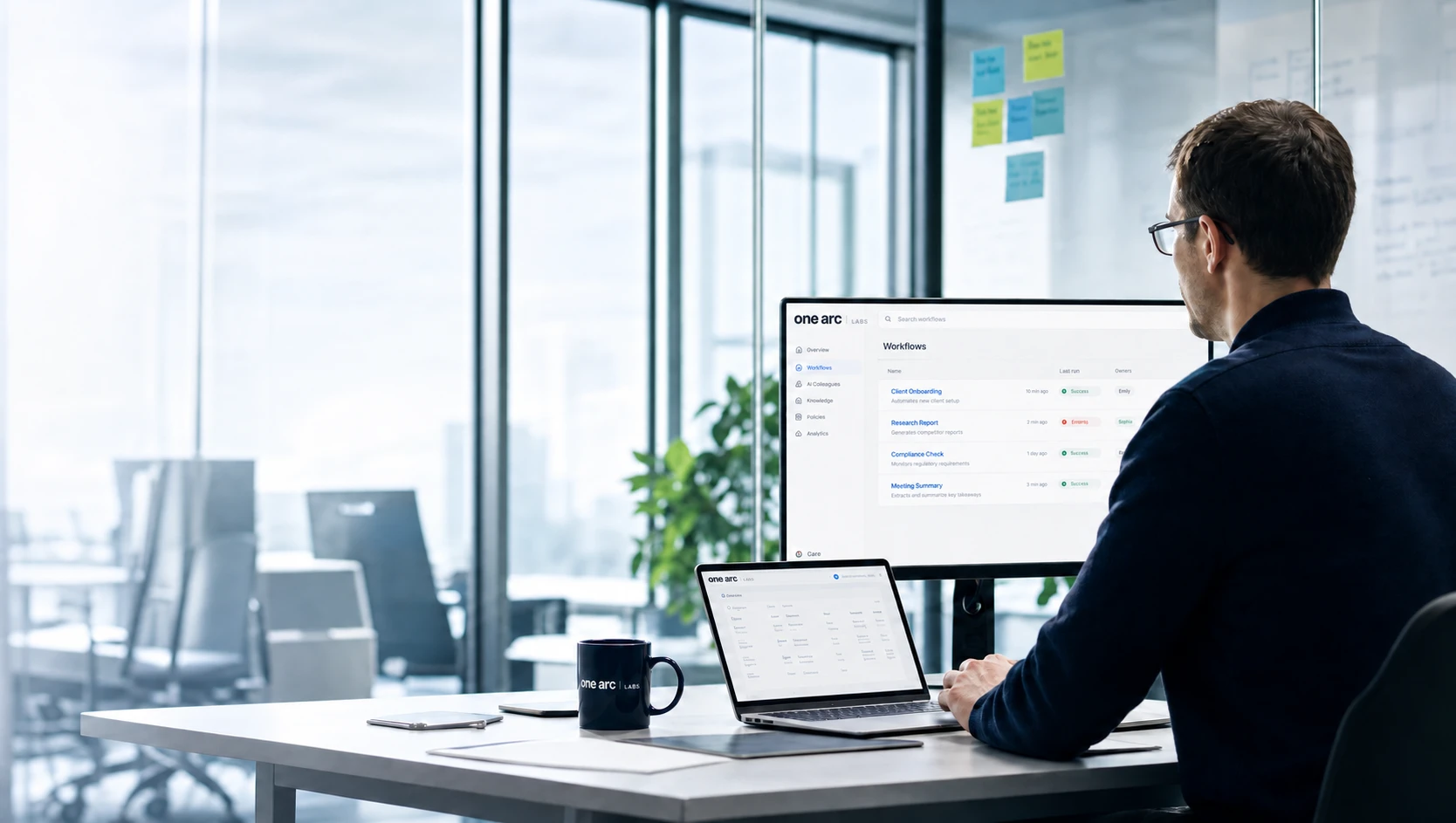 A colleague working with the One Arc Platform in a bright office
